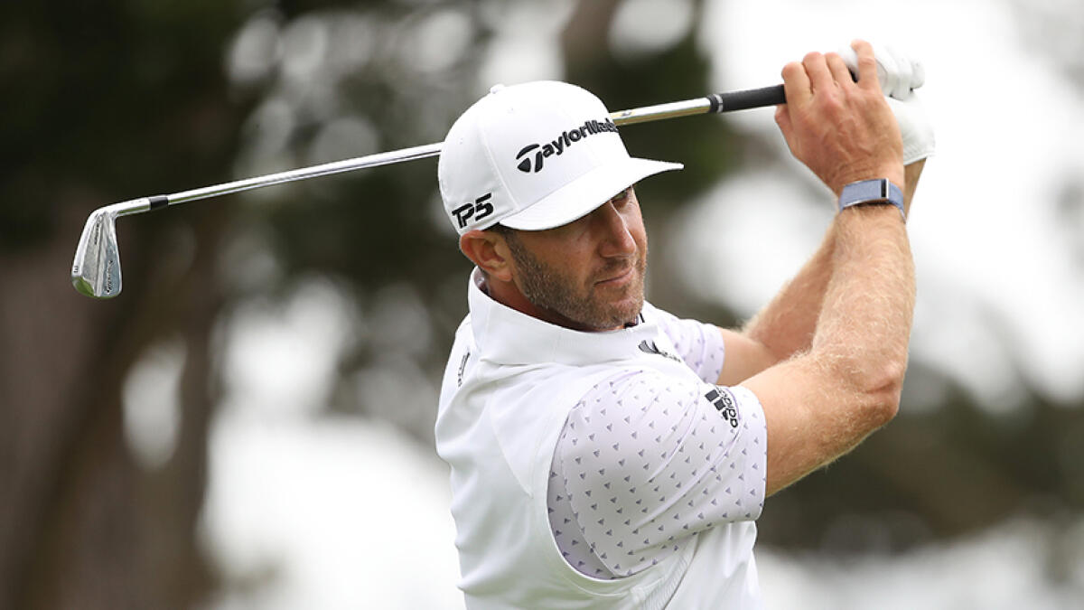 Dustin Johnson plays a shot from the 15th tee during the third round of the 2020 PGA Championship. -- AFP