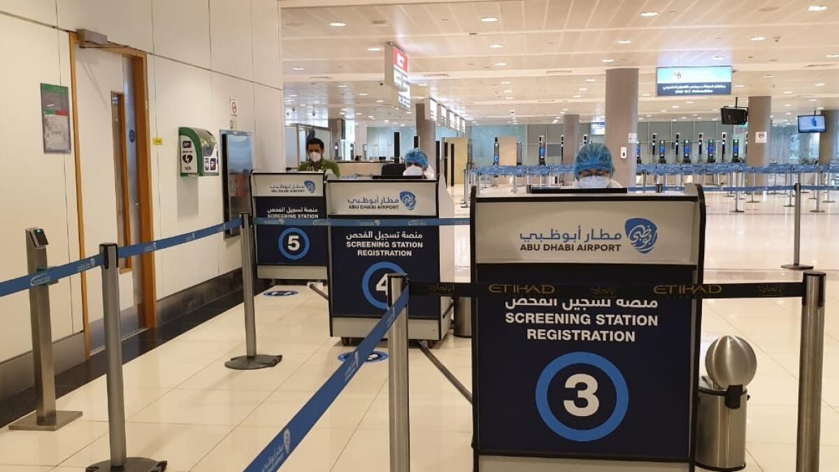 Abu Dhabi airport, covid-19, coronavirus, touchless elevator, escalator, sterilisation, sanitisation