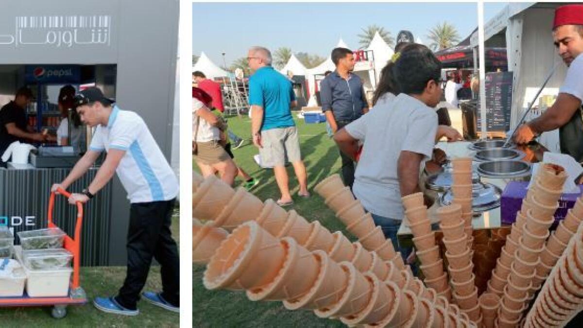 A shawarma shop experiences power cut on the first day of Flavour Festival; (right) A Turkish ice-cream vendor prepares a delicious treat for excited visitors. 