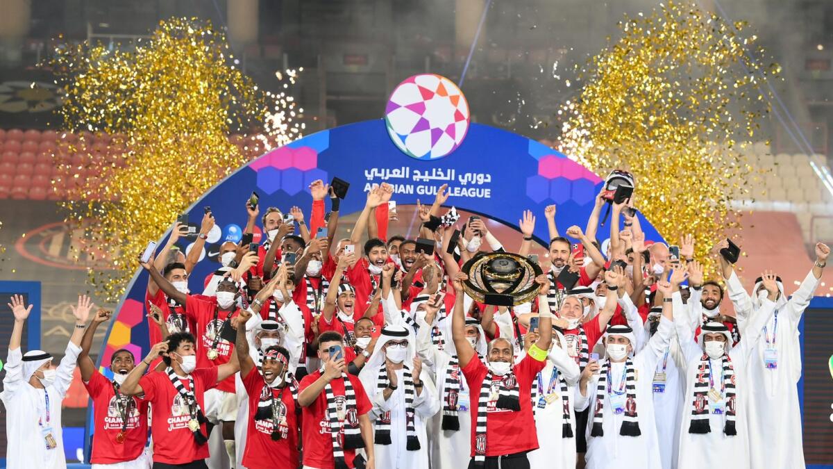 Al Jazira players and officials celebrate the Arabian Gulf League triumph. (Supplied photo)