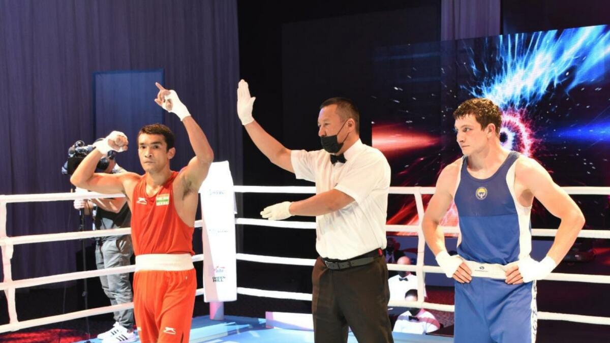 Shiva Thapa (left) celebrates his victory. (Boxing Federation of India Facebook)