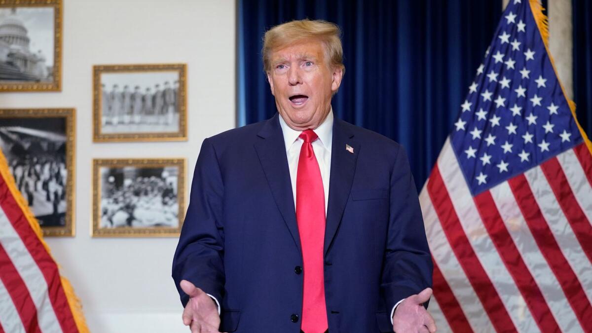 Former President Donald Trump speaks to the media at a Washington hotel on Tuesday, after attending a hearing before the D.C. Circuit Court of Appeals at the federal courthouse in Washington. — AP