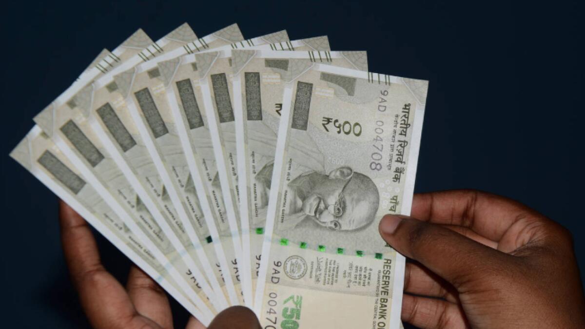 Indian rupee recovers early losses, stands at 73.42 to dollar