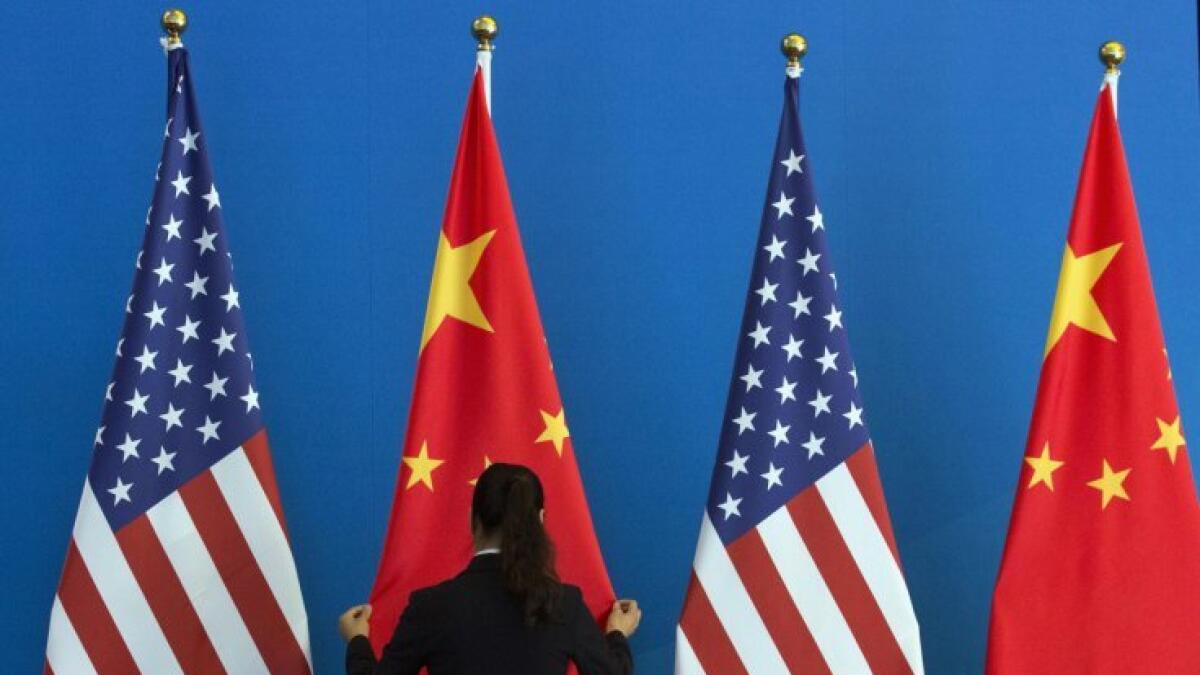 China says cant hold US trade talks with knife to the throat 