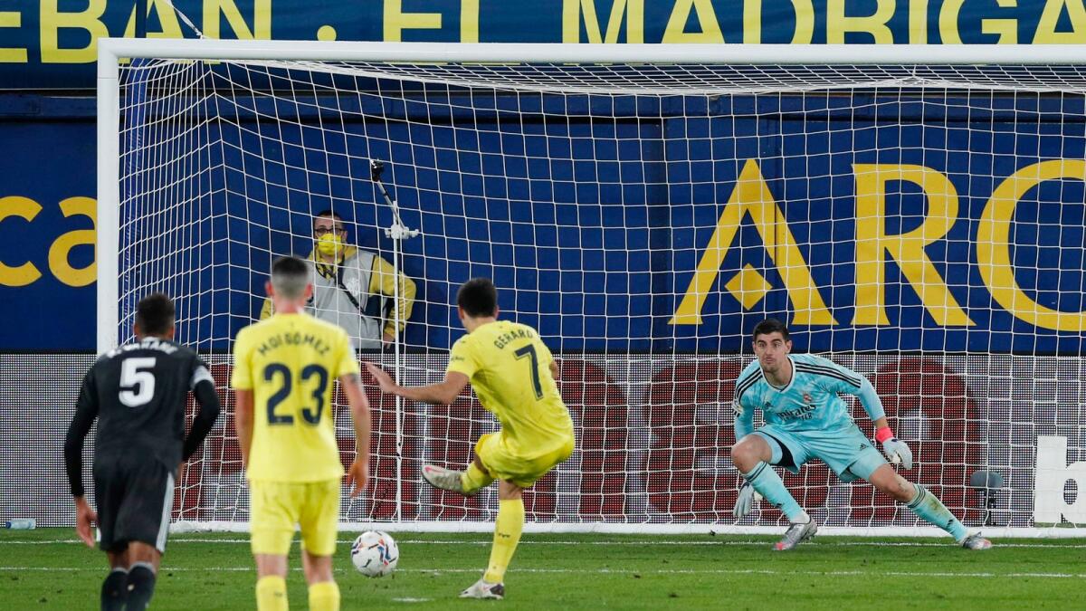 Villarreal's Gerard Moreno scores their a goal against Real Madrid. — Reuters