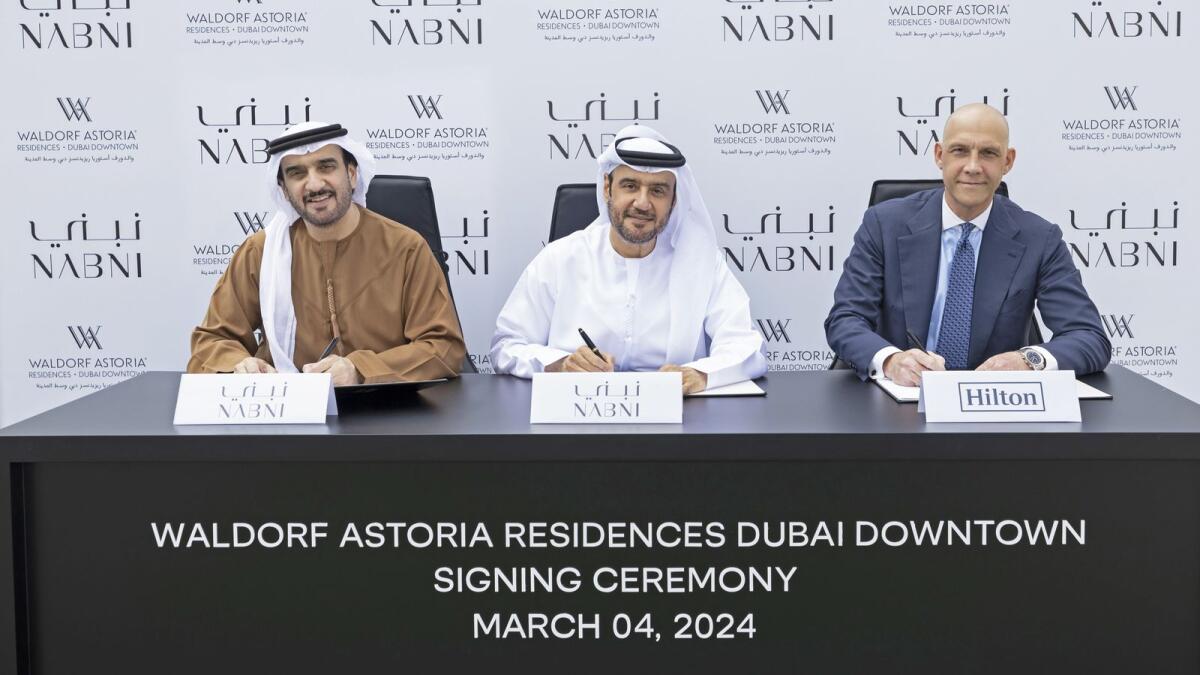 Signing of Waldorf Astoria Residences Dubai Downtown - (Left to Right) Badr Alsuwaidi, Co-Founder and CEO of NABNI Developments; Abdulrahman Alsuwaidi, Co-founder and Chairman of NABNI Developments; and Daniel Wakeling, Vice President of Development, Luxury &amp; Residential - Europe and Africa, Hilton.