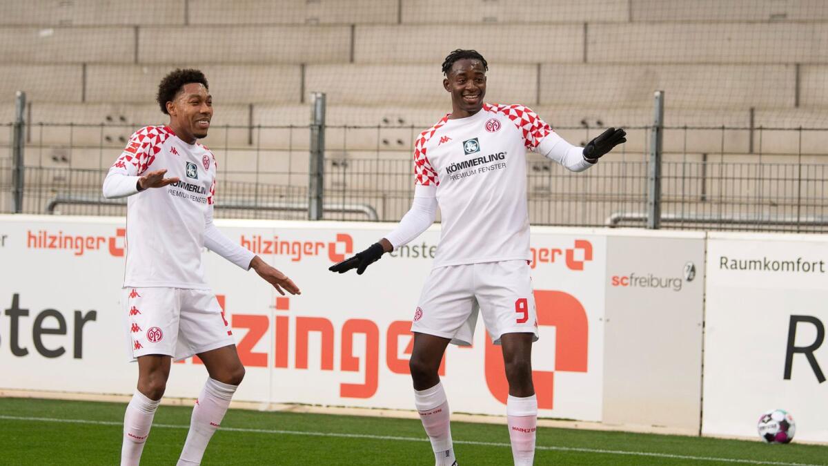Mainz's Jean-Philippe Mateta (right) celebrates his goal with teammate Jean-Paul Boetius. — AP