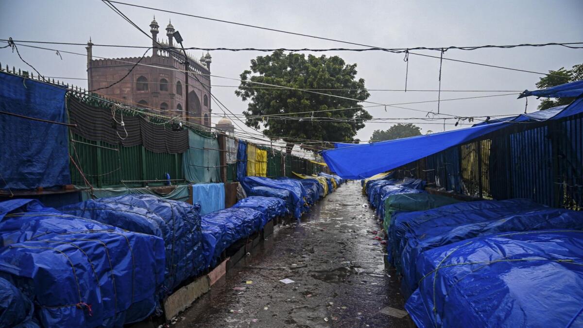 Closed stalls are seen on a market near Jama Masjid during a Delhi state-wide weekend curfew imposed by the authorities to curb the spreading of the Covid-19 coronavirus in New Delhi on January 8, 2022. (Photo: AFP)