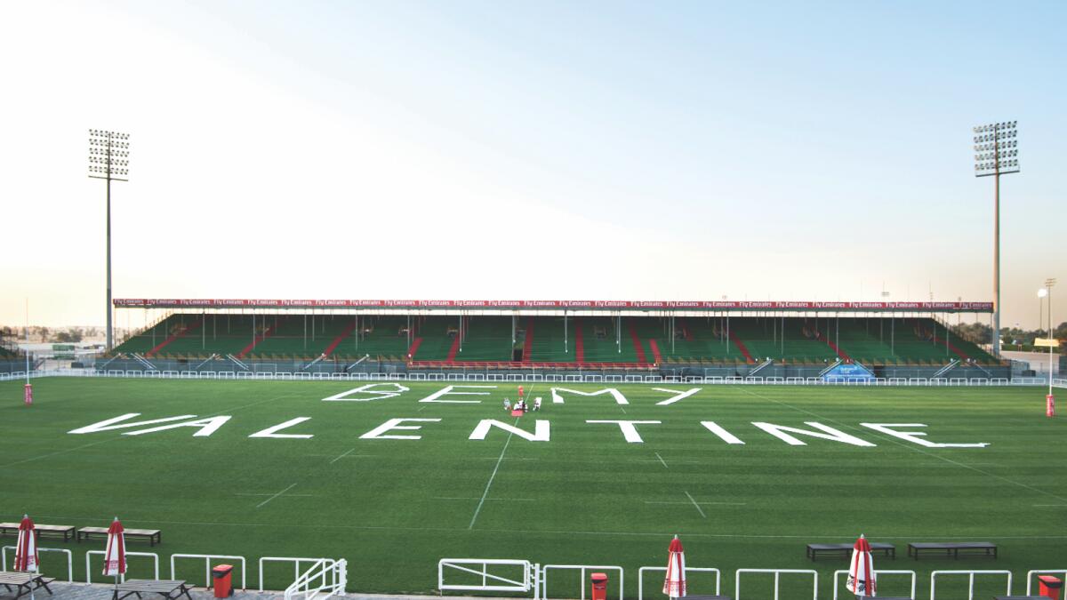 A romantic proposal on the pitch of Rugby Sevens stadium with hundreds of metres of fabric to spell out ‘BE MY VALENTINE’
