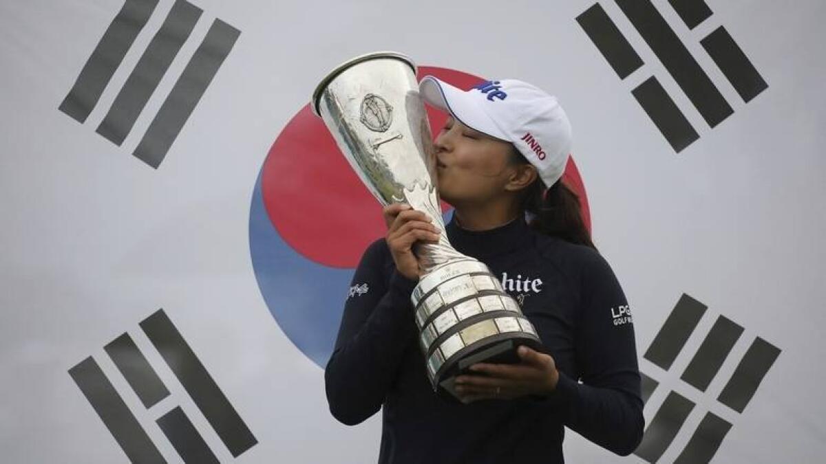 South Korea's Ko Jin-young kisses the trophy after winning the Evian Championship last year. - AP file