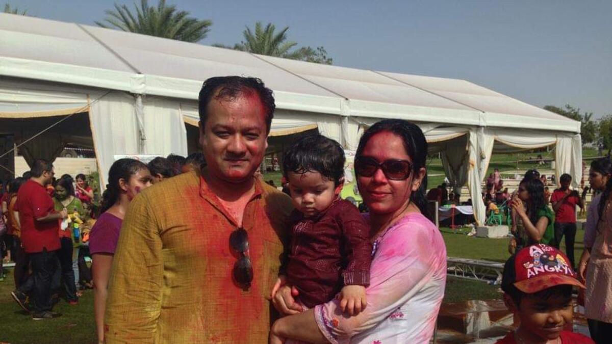 Debajit Brahmachary with his family celebrating Holi. Photo: Supplied