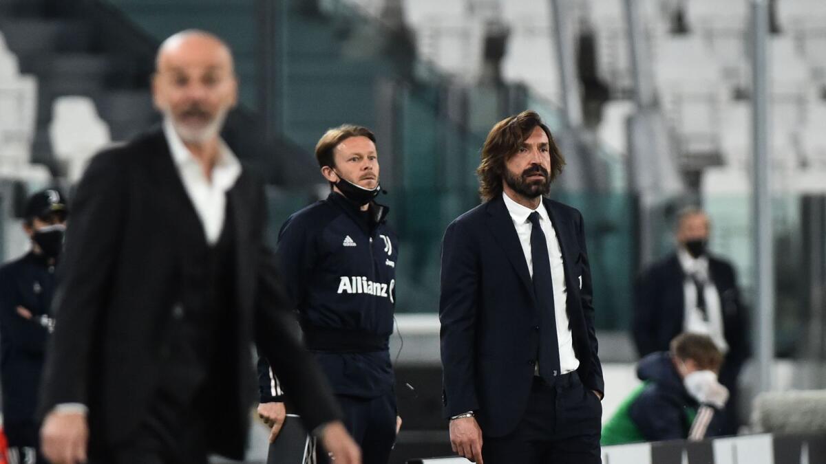 Juventus coach Andrea Pirlo and AC Milan coach Stefano Pioli.— Reuters