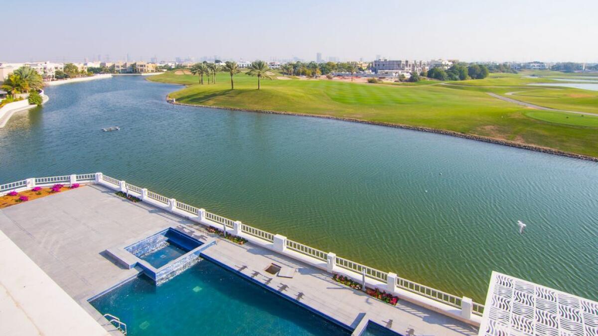 The villa has coveted views of the lake, the Address Montgomerie golf course and the Dubai Marina and JLT skyline.