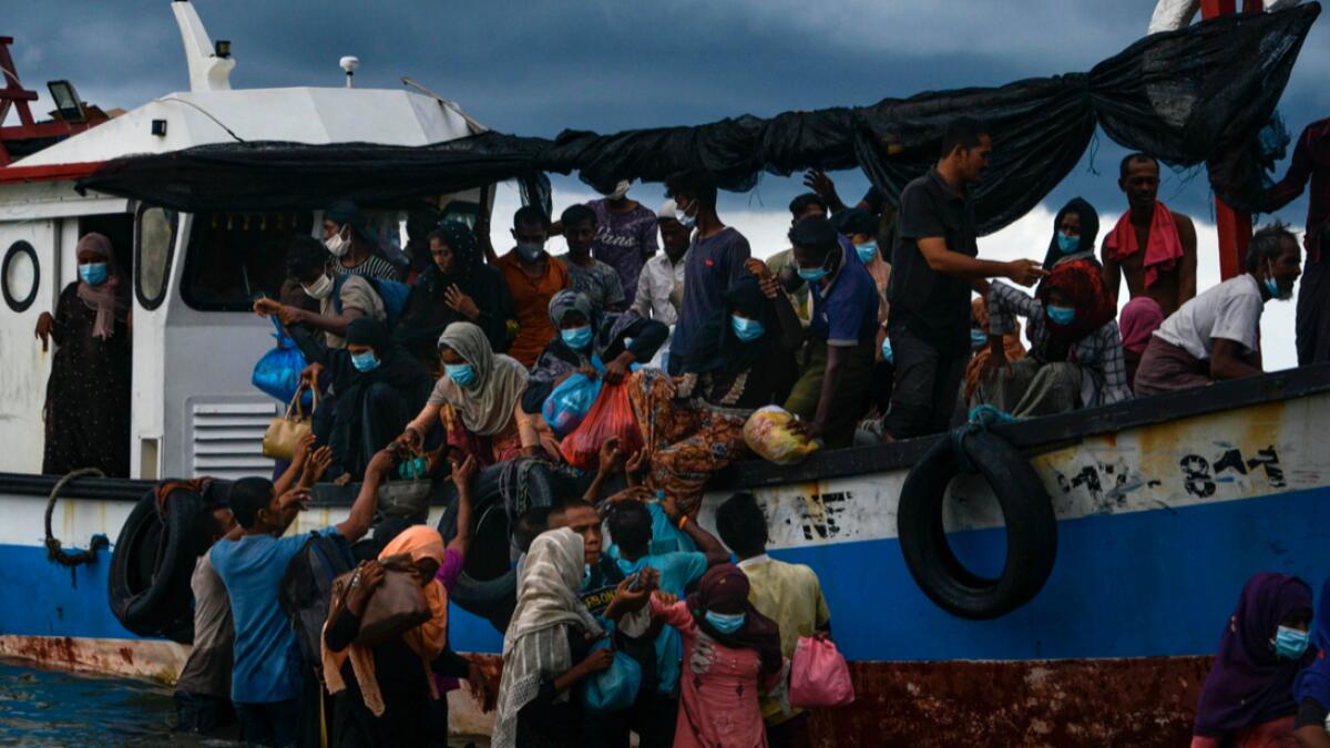 Nearly 100 Rohingya from Myanmar, including 30 children, have been rescued from a rickety wooden boat off the coast of Indonesia's Sumatra island. Photo: AFP