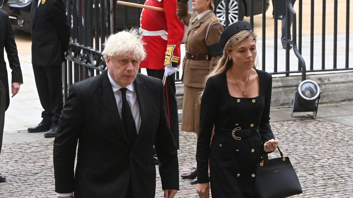 The funeral of Her Majesty the Queen at Westminster Abbey - Picture shows Boris and Carrie Johnson    September 19, 2022. Geoff Pugh for the Telegraph/Pool via REUTERS