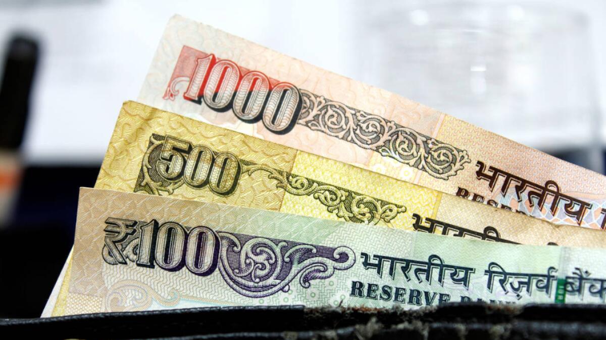 Rupee sinks to all-time low, breaches 74-mark against US dollar