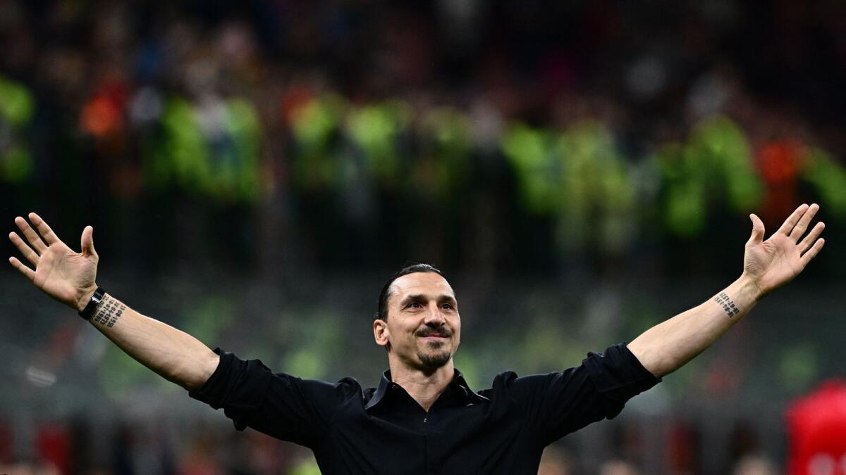 AC Milan's Swedish forward Zlatan Ibrahimovic acknowledges the public during a farewell ceremony. — AFP