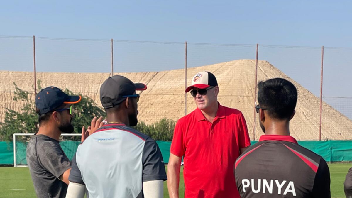 Tom Moody (centre) with UAE Under-19 players. — Supplied photo