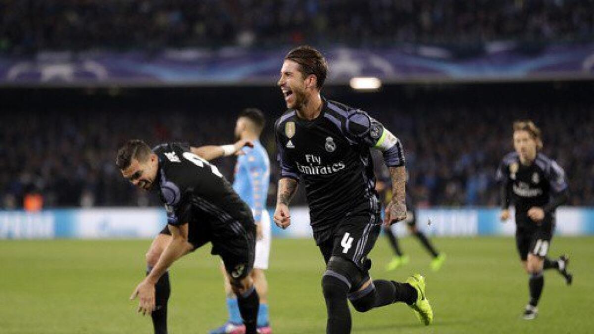 Real Madrid beats Napoli 3-1 to reach Champs League quarters