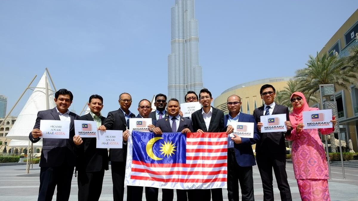 Malaysian diplomats fly flag at Burj Khalifa to celebrate Independence Day
