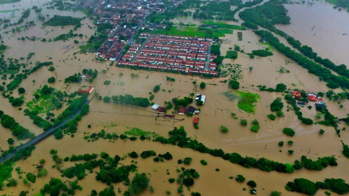 Aerial view of floods caused by heavy rains in the city of Itapetinga, southern region of the state of Bahia, Brazil. — AP