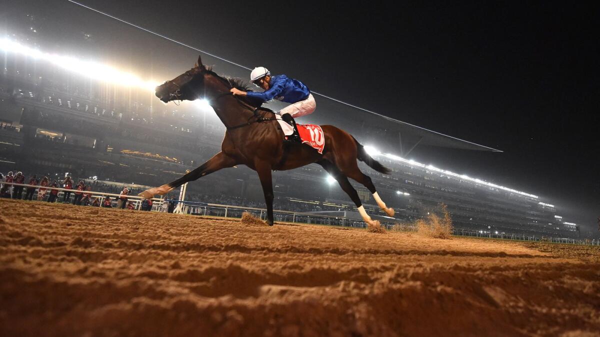 Jockey Christophe Soumillon rides Thunder Snow across the finish line to win the Dubai World Cup in 2018. Photo: AFP file