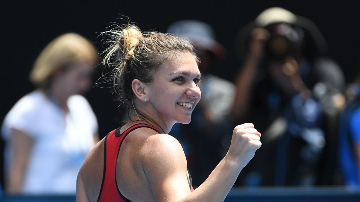 Top seed Halep hails new Simona after epic victory