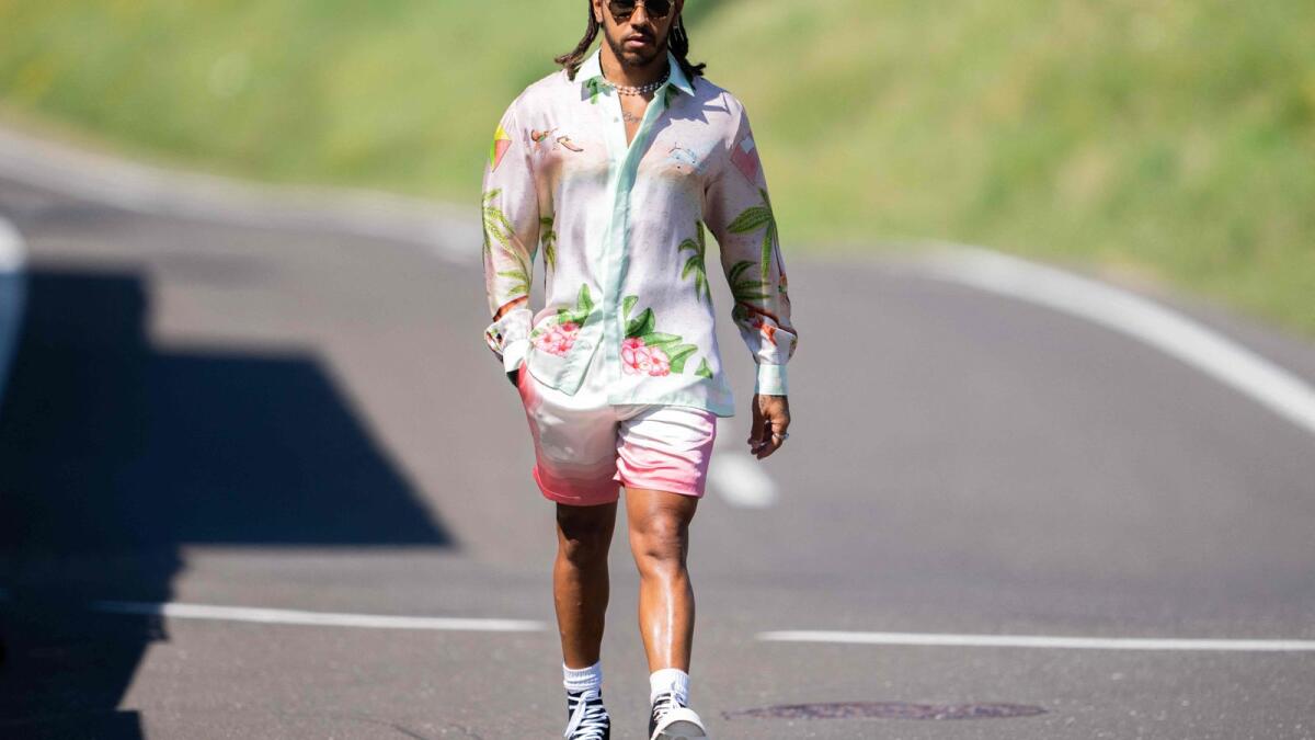 Lewis Hamilton arrives for the third practice session at the Red Bull Ring race track in Spielberg, Austria. — AFP