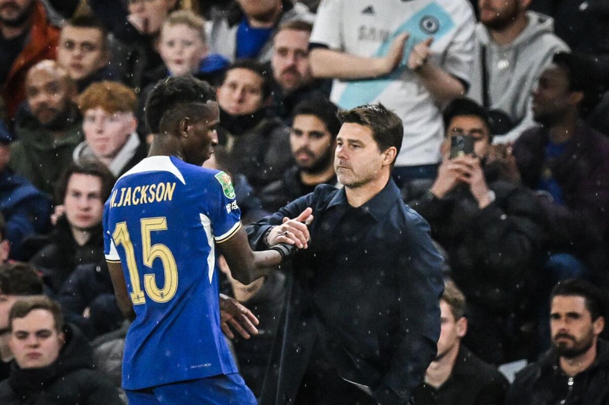 Chelsea coach Mauricio Pochettino congratulates Nicolas Jackson as he leaves the pitch after scoring a hat trick. — AFP