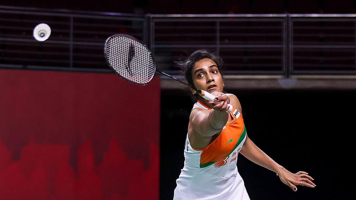 India's PV Sindhu plays a forehand return to Thailand's Busanan Ongbamrungphan. (AFP)
