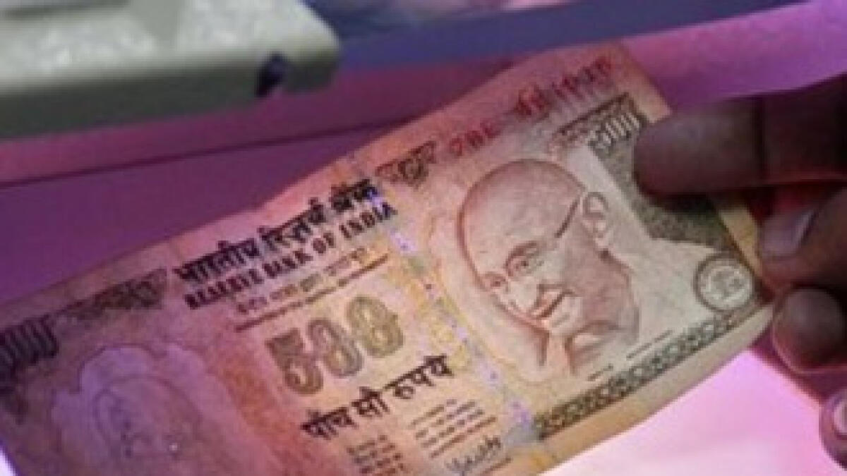 Indian Rupee hits record low