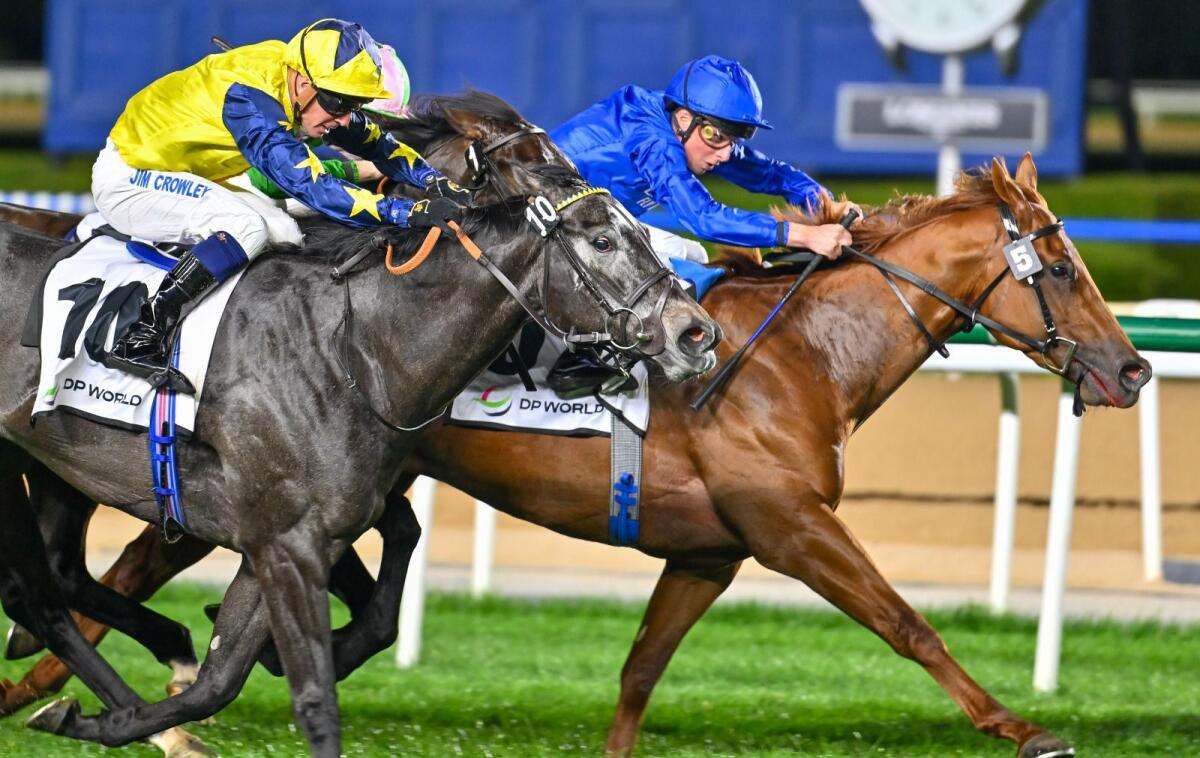 Great Truth and William Buick deny Frost Of Dawn in the Dubai Trophy Presented by DP World at Meydan. KT Photo by Sajjad.