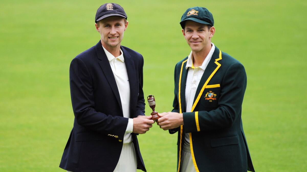 England captain Joe Root (left) and Australia's captain Tim Paine pose with the Ashes urn before the first Ashes Test on July 31, 2019.  (AP file)