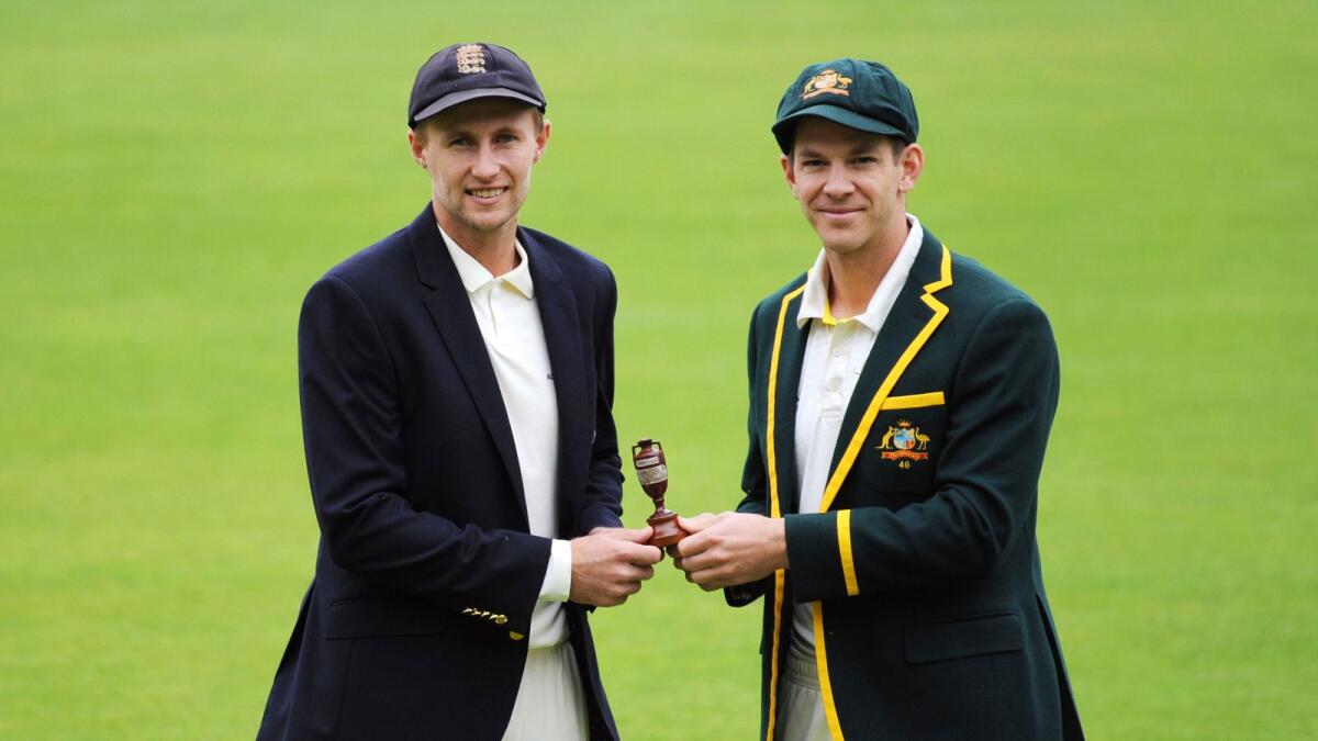England captain Joe Root (left) and Australian skipper Tim Paine pose with the Ashes urn before the start of the 2019 series. (AP file)
