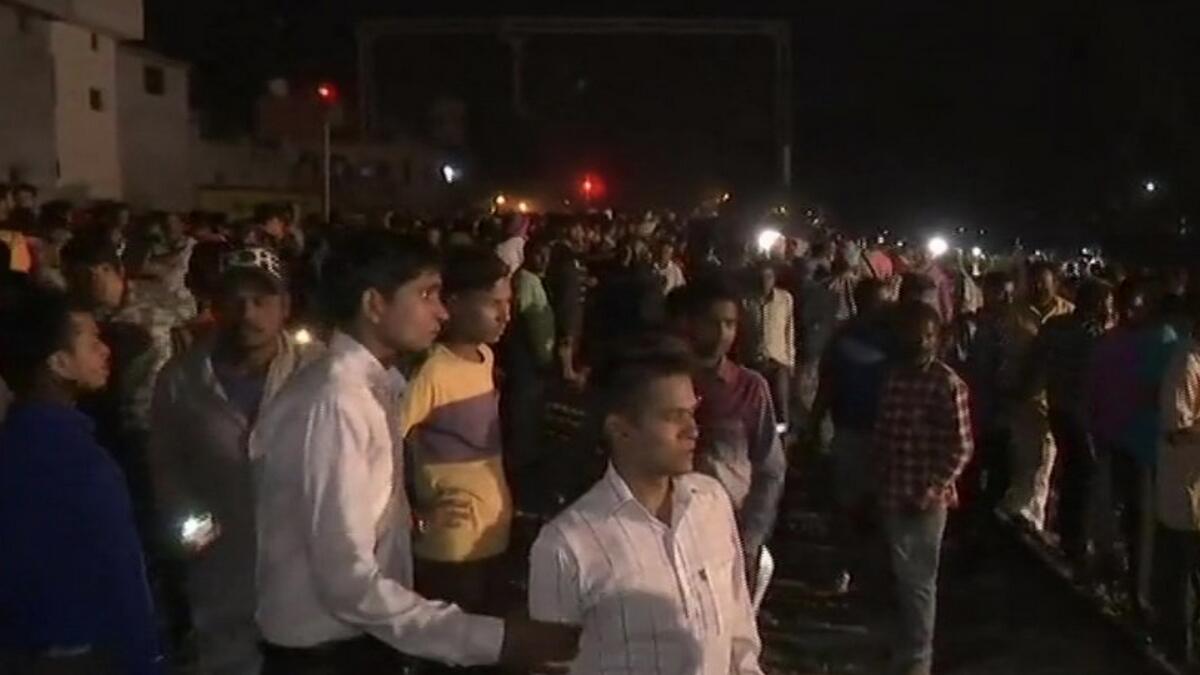 52 killed as train runs over revellers in India