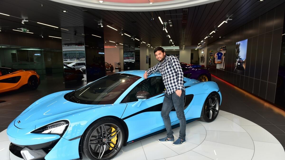 UAE worker wins supercar after renewing phone registration