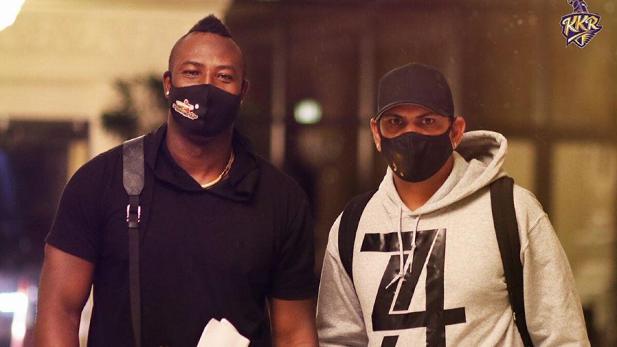 Andre Russell and Sunil Narine seen on their arrival in Abu Dhabi on Sunday. - KKr Twitter