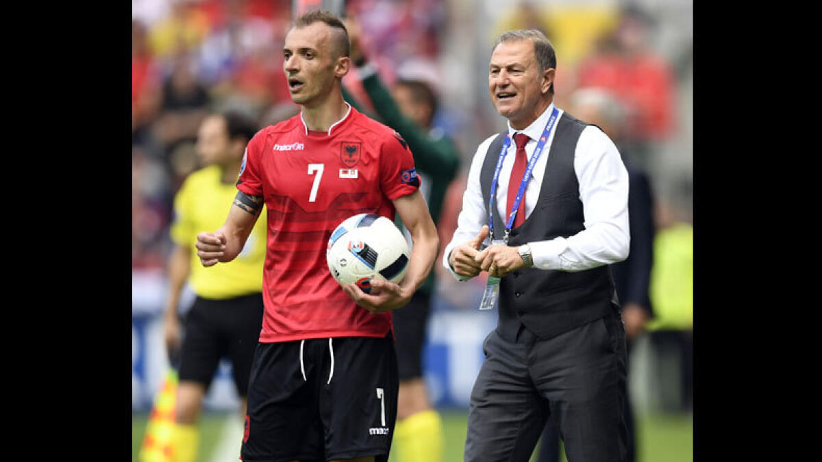 Albania's coach Gianni De Biasi with Albania's defender Ansi Agolli. (AFP)