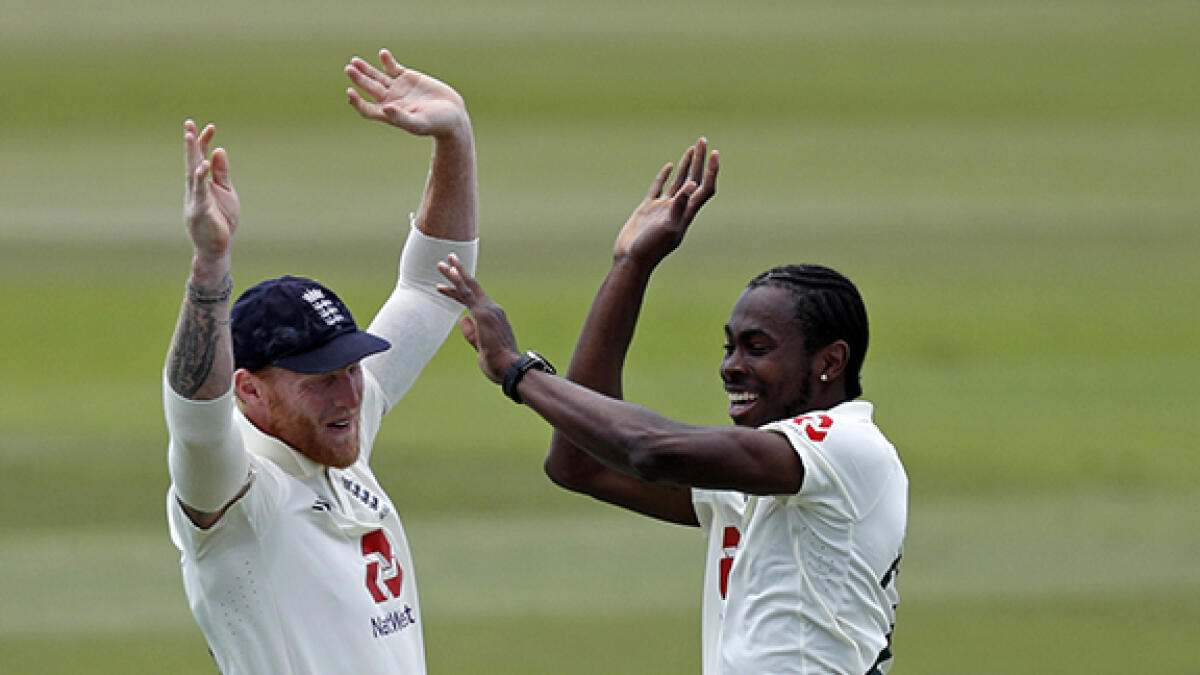 Ben Stokes said the team would be there to support fast bowler Jofra Archer (right), who was dropped for breaching bio-secure protocols. -- AFP
