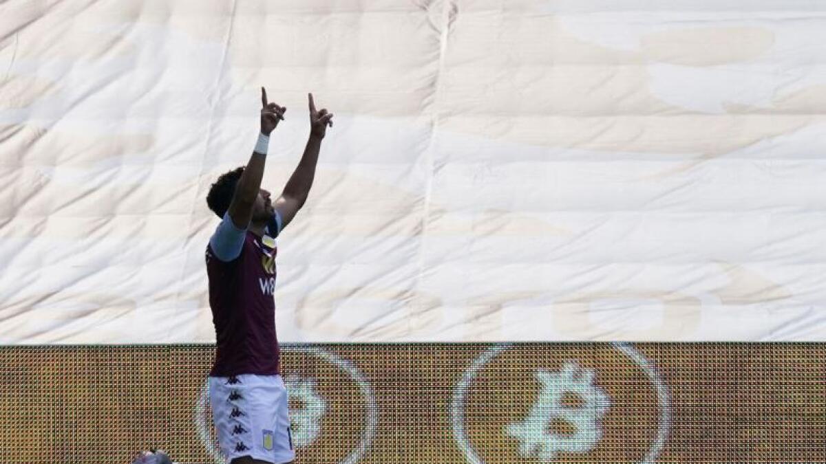 Aston Villa's Trezeguet celebrates scoring their second goal. (Reuters)