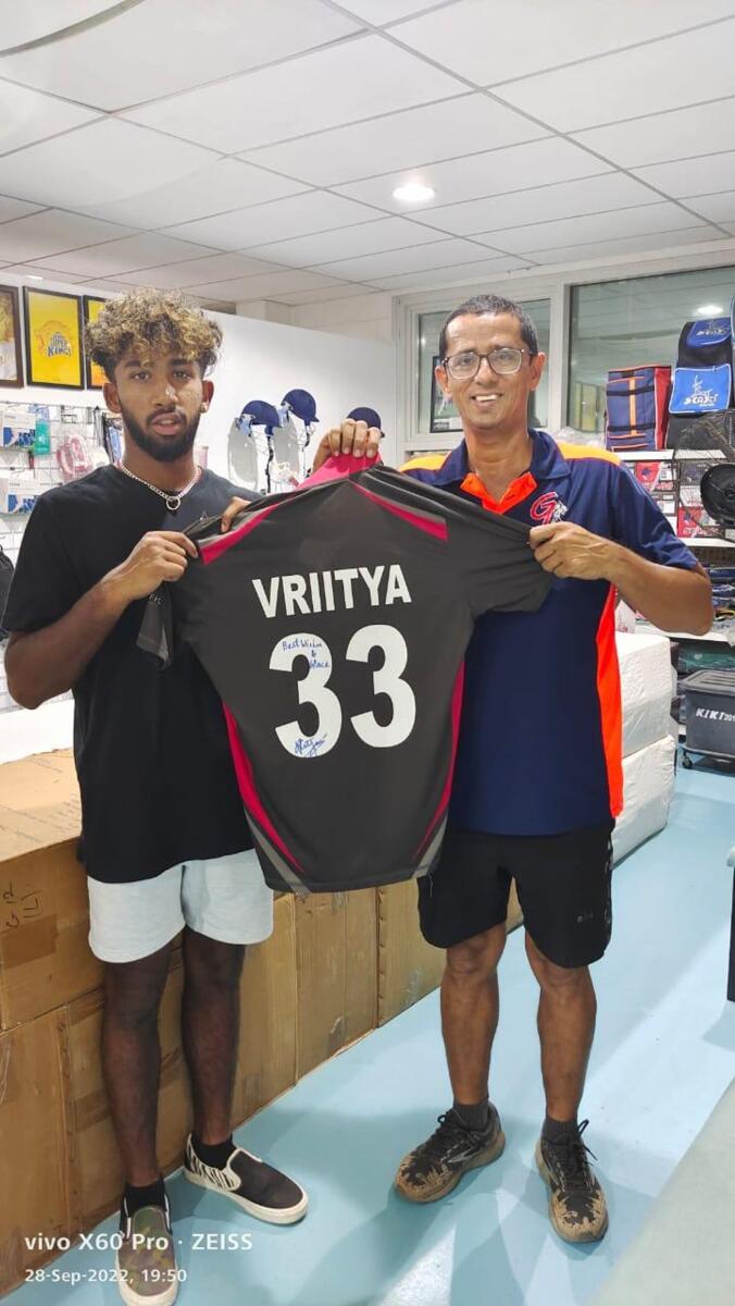 Vriitya Aravind with G Force Cricket Academy head coach Gopal Jasapara. (Supplied photo)
