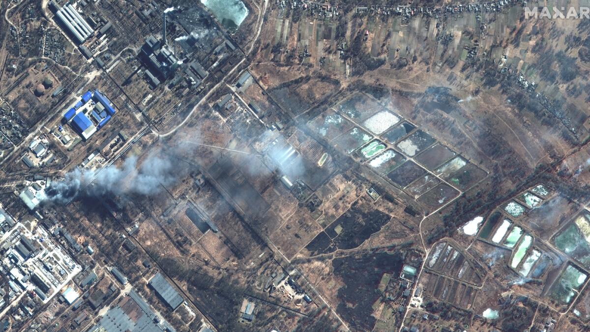This Maxar satellite image taken and released on March 10, 2022 shows an overview of fires burning in an industrial area and nearby fields in southern Chernihiv, Ukraine. Photo: AFP