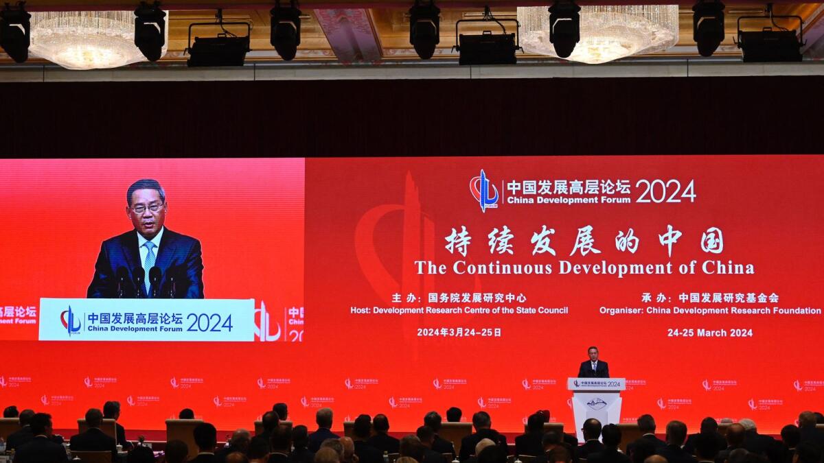 China's Premier Li Qiang delivers his speech during the China Development Forum in Beijing on Sunday. — AFP