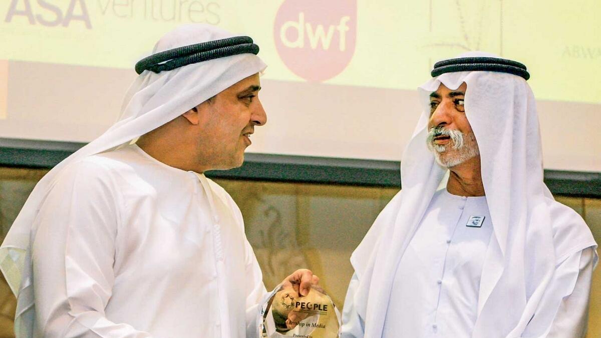 Suhail Abdul Latif Galadari receives his award from Sheikh Nahyan bin Mubarak Al Nahyan for advocating a media business which enabled job creation in Dubai.-Photo by Mohammed Mustafa Khan
