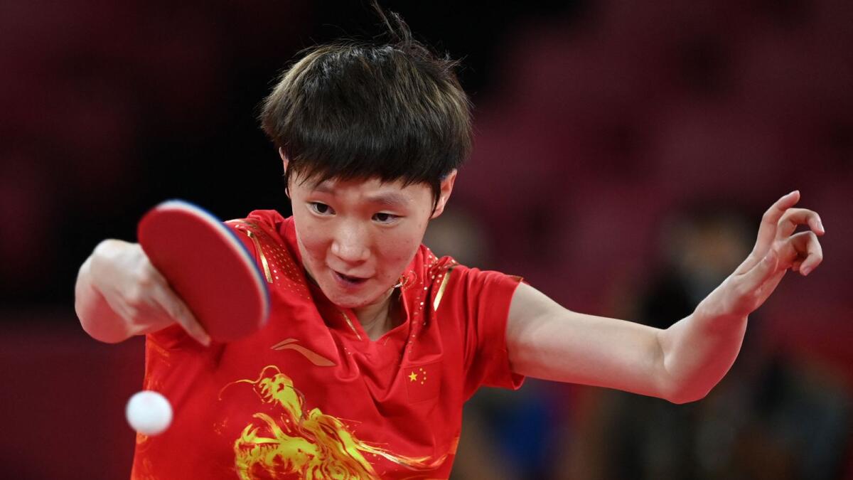 China's Wang Manyu plays a shot during the women's team final table tennis match at the Tokyo Metropolitan Gymnasium. — AFP