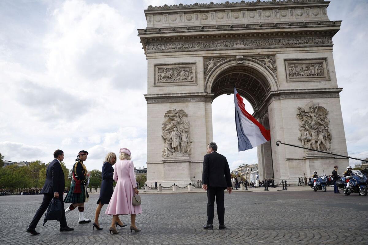 Britain's Queen Camilla and French President Emmanuel Macron's wife Brigitte Macron attend a remembrance ceremony at Arc de Triomphe Paris. Photo: Reuters