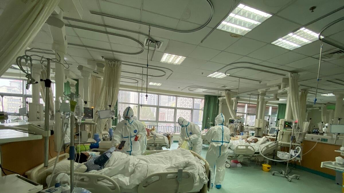 China’s national health commission reported more than 1,400 confirmed new cases on Wednesday, as the death toll rose to 132.