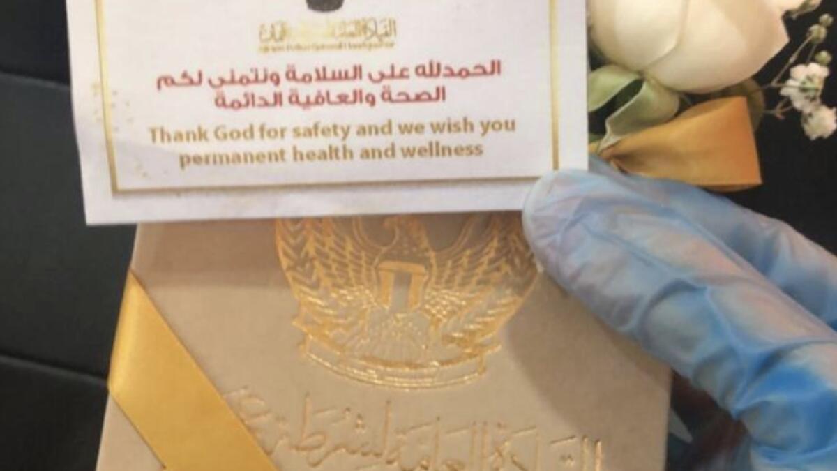 UAE cops, surprise, Covid-19 patients, roses, get-well cards, 