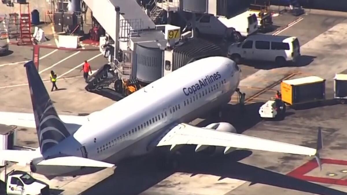 Boy opens planes emergency door, jumps out