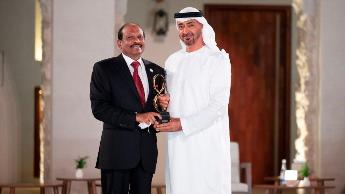 Yusufali M.A. receives the award from Sheikh Mohamed bin Zayed Al Nahyan. Supplied photos